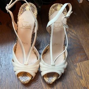 Christian Louboutin peep toe snake heel